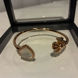 Elegant Gold and White Bangle Bracelet